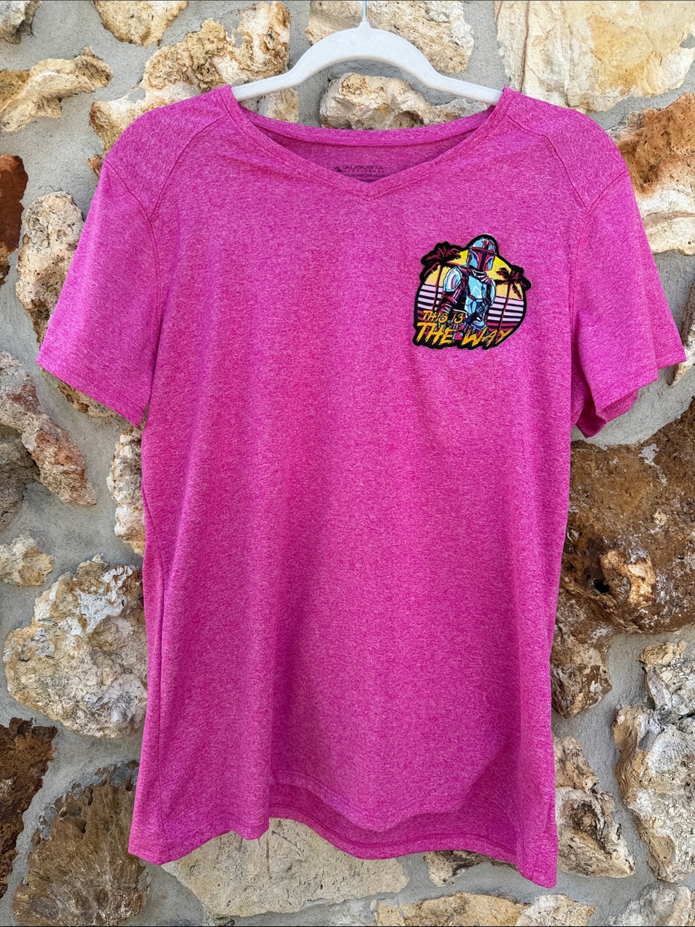 Upcycled sportswear shirt with mandalorian patch